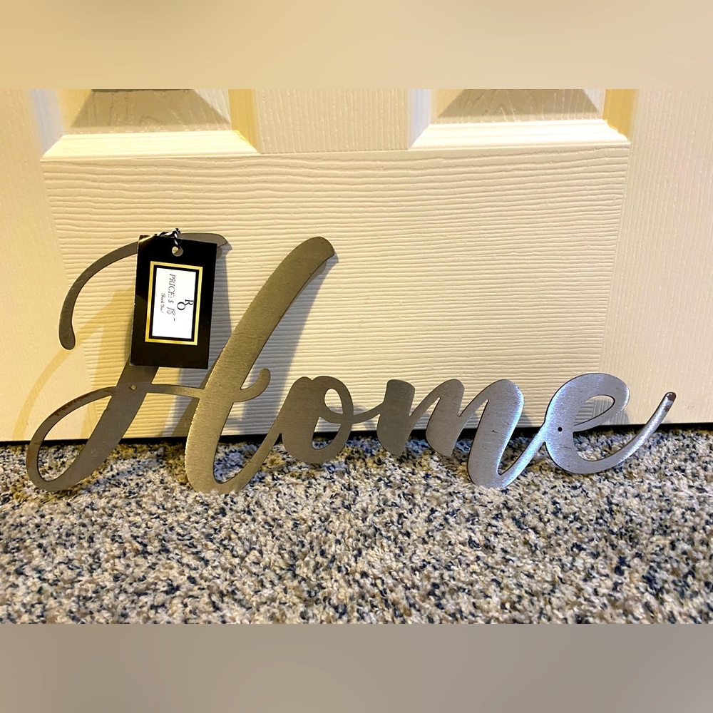 “Home” metal sign